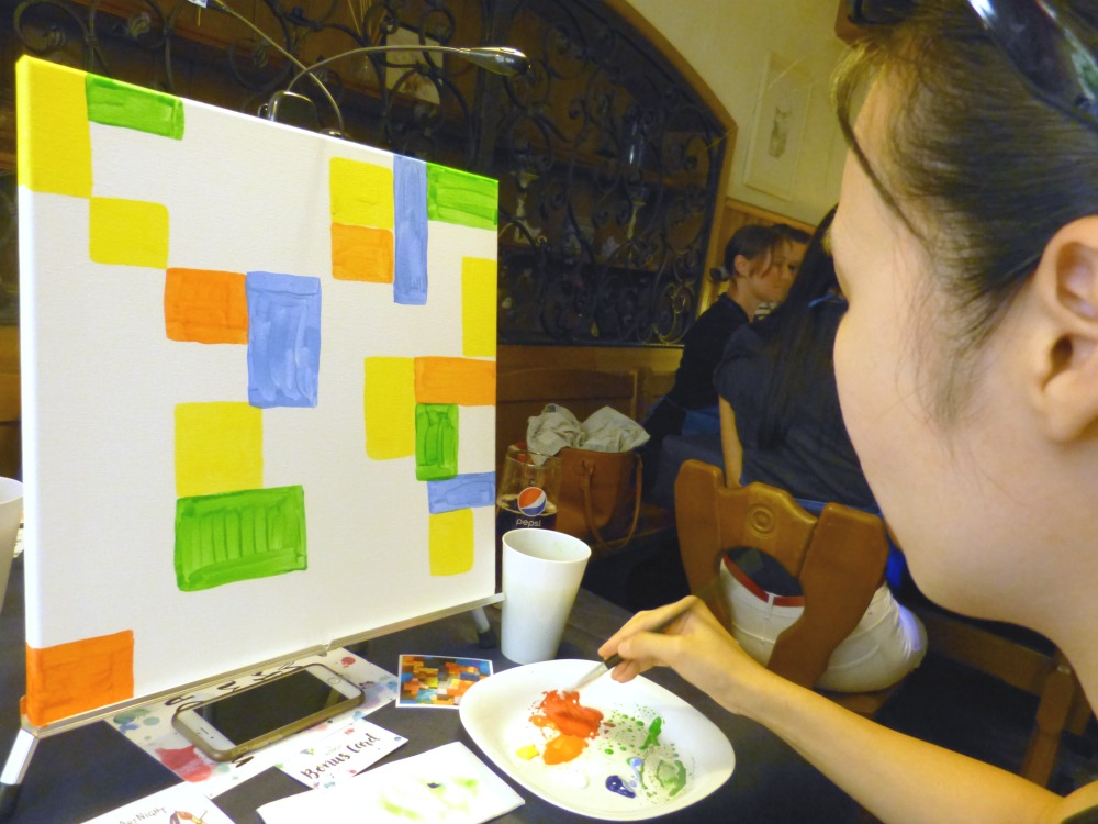 In the middle of the workshop "Paint like Paul Klee" at ArtNight Stuttgart.